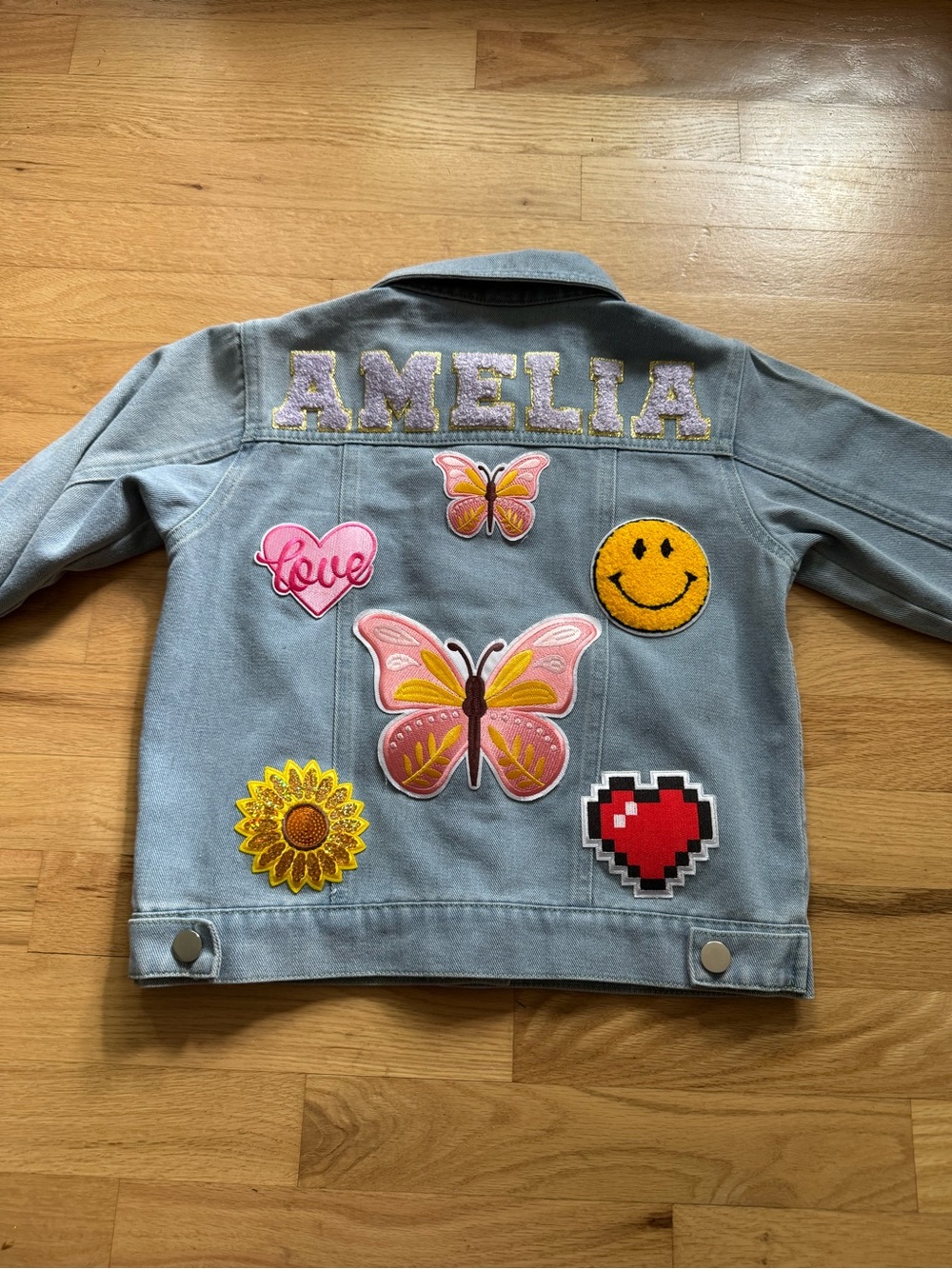 Girls light wash denim jacket, size 130 (fits approximately 6-7 years